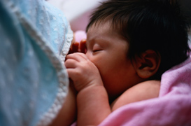 photo of baby breastfeeding